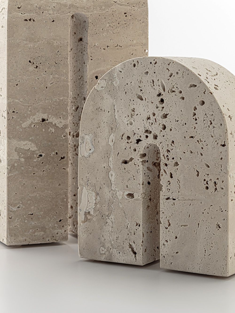 SUJETA LIBROS BARNET TRAVERTINE